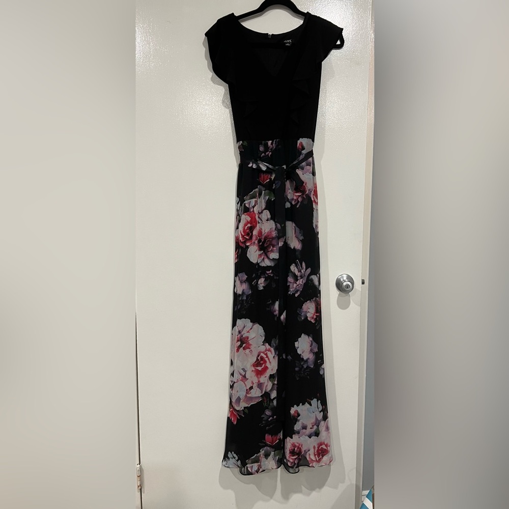 Size 10 black and flower dress nice for special occasion.